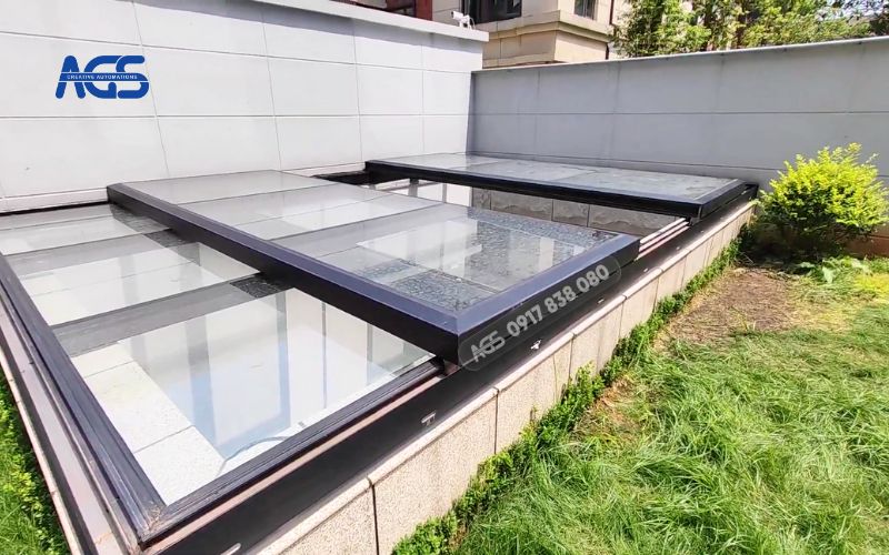 Mái kính tự động che chắn khu vực hầm